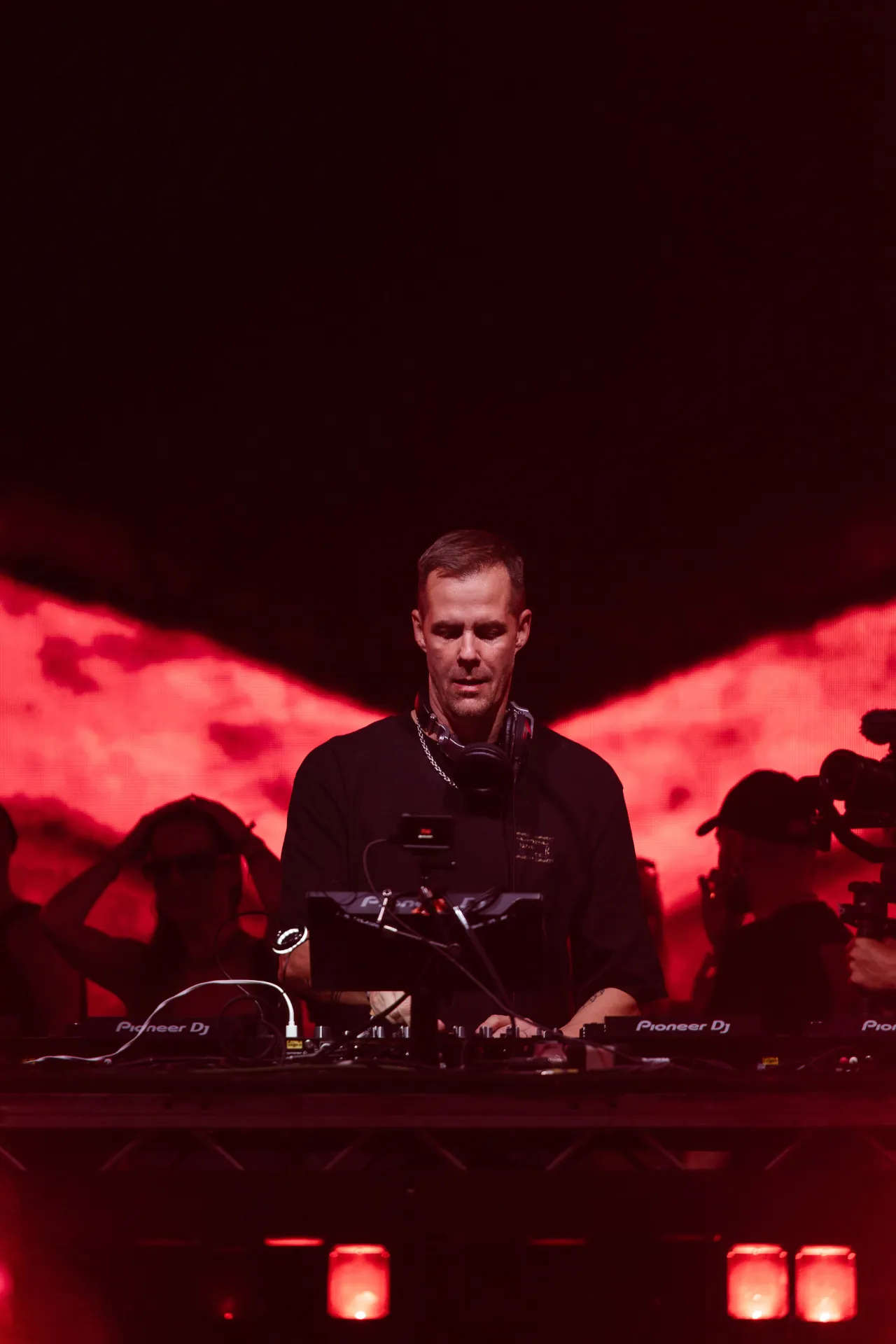 Musicians playing live at a concert, engaging with the audience and delivering an electrifying performance